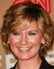 Jennifer Nettles sporting a short haircut with layers and bangs