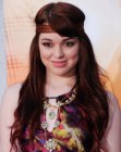 Jennifer Stone long 1960 or 1970s hairstyle with a hair band
