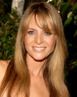 Jessalyn Gilsig's long hairstyle with casual bangs