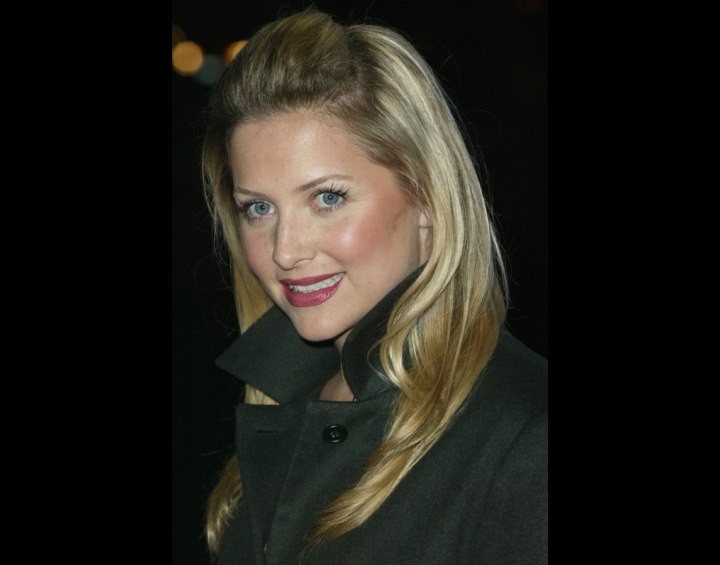 Jessica Capshaw's hair brought back and fastened on the top of the crown