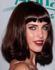Jessica Lowndes sporting a mid-length bob wit volume and short bangs