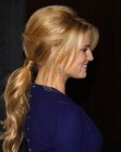 Jessica Simpson with her hair pulled back into a low ponytail