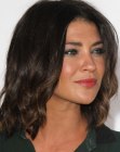 Jessica Szohr with curly above the shoulders hair