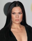 Jessie J wearing her hair long and sleek with a dramatic middle part