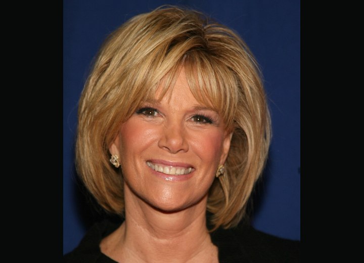 Joan Lunden with her hair in a neck length semi bob
