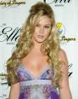 Joss Stone with her long hair curled for a messy look