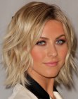 Julianne Hough wearing her blonde hair in a curled collar length bob