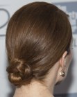 Julianne Moore with her smooth hair styled up in a chignon