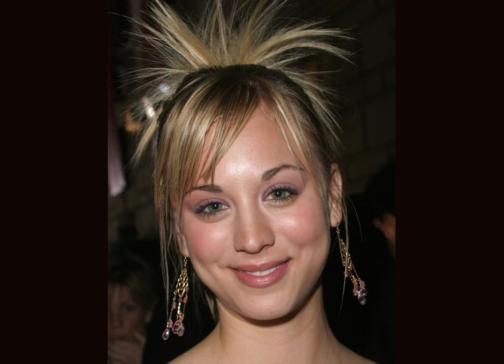 Kaley Cuoco's ponytail with sprays of hair