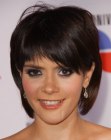 Kany Garcia wearing a bob with the sides tucked behind her ears