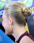 Kate Bosworth with all of her hair pulled into a tight bun