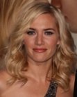 Kate Winslet's long hair with layers and bouncy curls