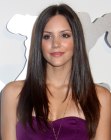 Katharine McPhee's sleek long 1960s hairstyle with a strong middle part