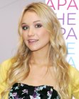 Katrina Bowden wearing her hair long and curled