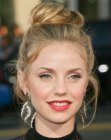 Kelli Garner's hair updo with a top knot