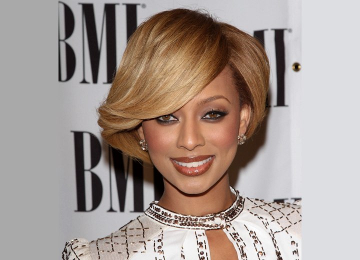 Keri Hilson wearing a short capped hairstyle