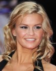 Kerry Katona's hairstyle with spiral curls along the sides of her face