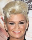 Kerry Katona's sophisticated short hairstyle with curled top hair