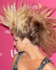 Kesha's hair styled into a giant mohawk
