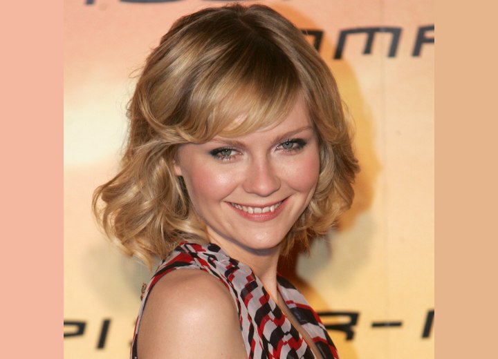 Previous Kirsten Dunst with bouncy curls