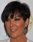 Kris Jenner sporting a pixie with long bangs