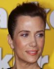 Kristen Wiig with her hair styled for a fake pixie cut look