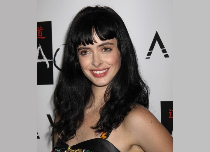 Krysten Ritter's long hairstyle with short bangs