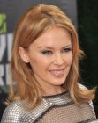 Kylie Minogue wearing shoulder length hair with flipping ends
