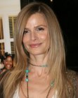Kyra Sedgwick with her long blonde hair tapered from the chin down
