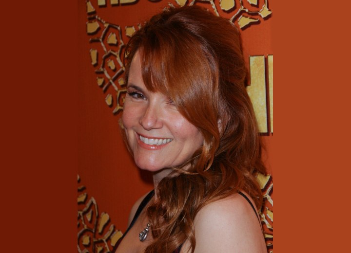 Lea Thompson with red hair and curls