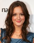 Brunette Leighton Meester with her long curled hair falling free and open