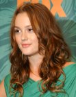 Leighton Meester with her long hair styled into curls and ringlets