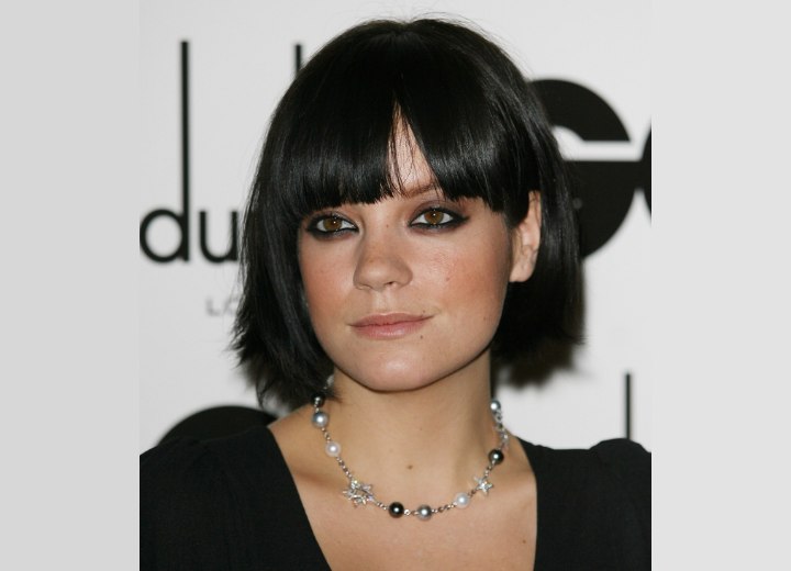 Lily Allen wearing a bob hairstyle with long bangs