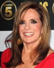 Linda Gray aged over 70 and wearing her hair long with asymmetrical bangs
