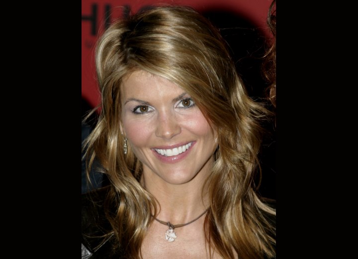 Lori Loughlin - Long hairstyle with layers cut throughout