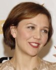 Maggie Gyllenhaal's conservative short hairstyle with layers