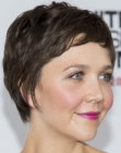 Maggie Gyllenhaal's short pixie hairstyle with layers