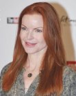 Marcia Cross with her red hair cut into a simple long style