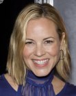 Maria Bello with her blonde hair cut into a just above the shoulders bob