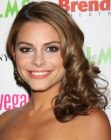 Maria Menounos with her long hair styled into spiraled curls