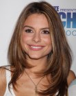 Maria Menounos sporting a long and casual layered style
