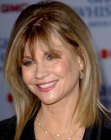 Markie Post with straightened shoulder length hair