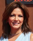 Martina McBride wearing her hair in an easy to manage shoulder length shag