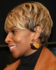 Mary J. Blige wearing a pixie with close to the head styling