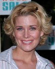 McKenzie Westmore wearing her hair short, layered and styled for volume