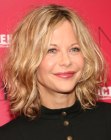 Meg Ryan's shag inspired haircut with messy styling