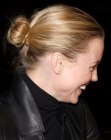 Melissa George with her hair in a bun