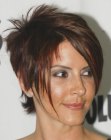 Michelle Clunie wearing her hair short and slithered