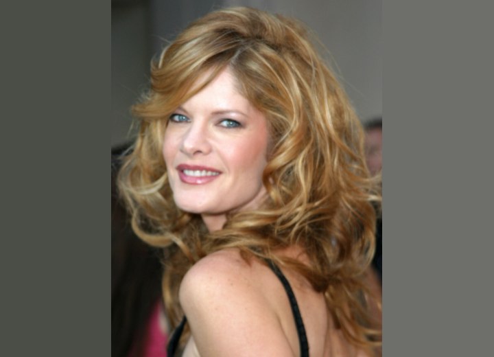 Michelle Stafford wearing her hair long with curls
