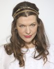 Milla Jovovich wearing her hair in a Medieval style